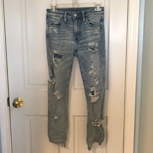 Acid wash ripped jeans